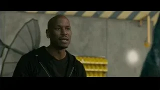 Bald man in hoodie in industrial setting — Furious Seven