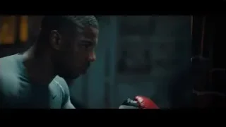 man looking at red boxing glove — Creed 2