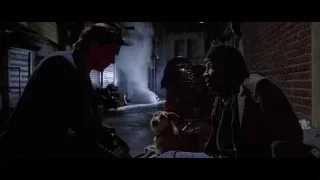 two men on bench in alleyway — American Psycho