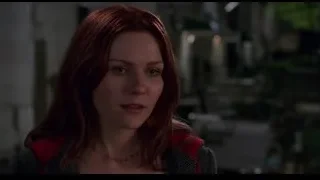 woman with red hair in outdoor setting — Spider Man
