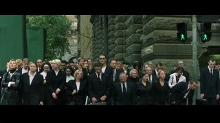 people walking in ancient city street — The Matrix