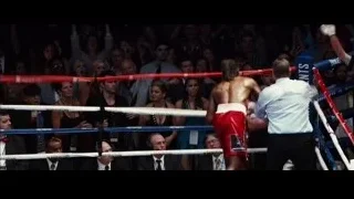 boxer throwing punch in boxing match — Southpaw