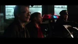 man standing by police car lights — Batman
