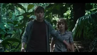 Two young men walking in forest — Jurassic World