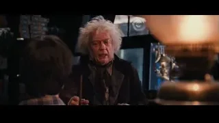 elderly man and boy in dimly lit room — Harry Potter and the Philosophers Stone