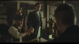 Man in top hat sitting at desk — Peaky Blinders