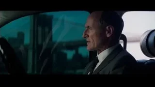 bald man in car looking at city — The Amazing Spider Man 2