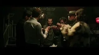 people in formal attire around table with tea — Now You See Me 2