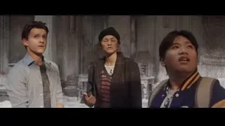 Three young people in dimly lit room — Spiderman: No Way Home