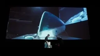man presenting computer on large screen — Steve Jobs