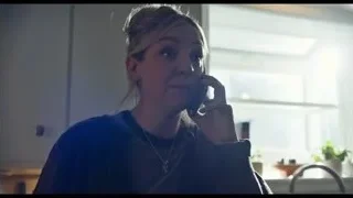Young woman talking on phone in kitchen — The Bear