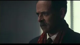 man in dark suit looking off to side — Peaky Blinders