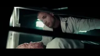 man in lab coat behind bars — Deadpool