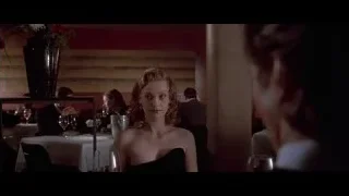 Woman in black dress at restaurant — American Psycho