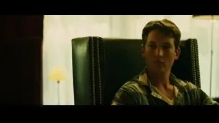 Young man in armchair deep in thought — Whiplash