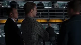 two men in dimly lit control room — The Avengers