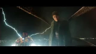 two men battling on bridge at night city skyline — Spiderman: No Way Home