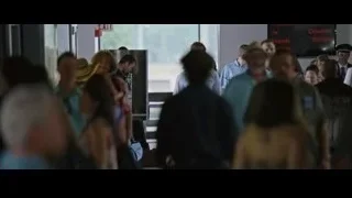 people walking in airport terminal hallway — The Big Short