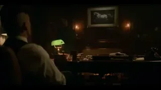 Men at desk in dimly lit room — Peaky Blinders