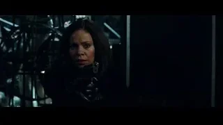 woman holding gun in dark room — Now You See Me 2