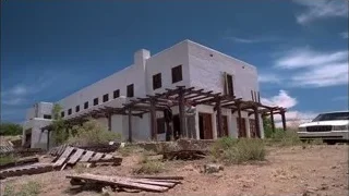 Military helicopter flying in blue sky — Breaking Bad