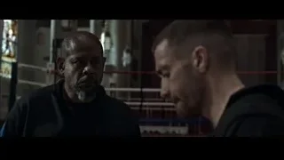two men conversing in boxing ring — Southpaw