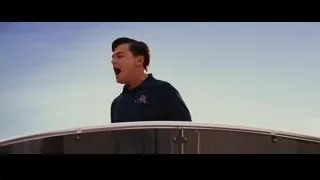 Man standing on large metal structure — The Wolf Of Wall Street
