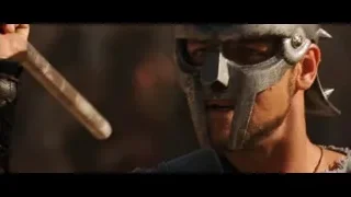 Man in spiked helmet with sword — Gladiator