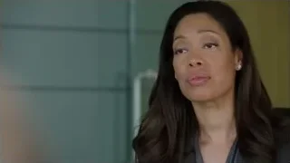 Woman with dark hair looking thoughtfully — Suits