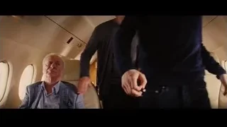 Elderly man in airplane with other passengers — Now You See Me