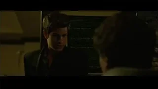 young man in suit at computer screen — The Social Network
