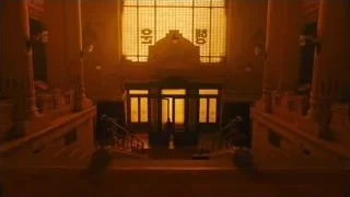 Large building interior with columns and door — Blade Runner 2049