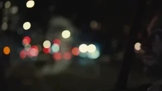 man looking out car window at night — Succession