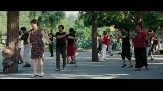 Group of people dancing in a park — The Karate Kid