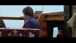 Two men on boat looking at ocean — Bruce Lee: Enter The Dragon