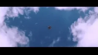 red airplane flying with smoke trail — Iron Man