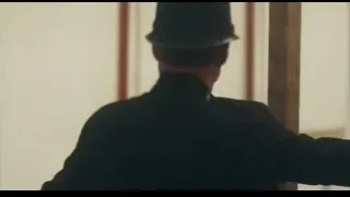 Man in suit walking down hallway — Peaky Blinders