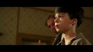 young boy looking at man in room — Hacksaw Ridge