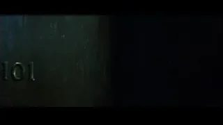 Person peeking from behind door with 101 — The Matrix