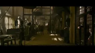 people in medieval prison corridor — Gladiator 2