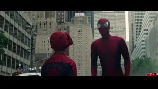 two Spidermen in front of police car — The Amazing Spider Man 2
