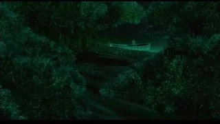Small boat on river at night — Life of Pi