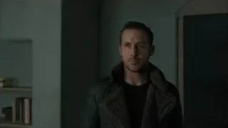 man standing in dimly lit room — Blade Runner 2049