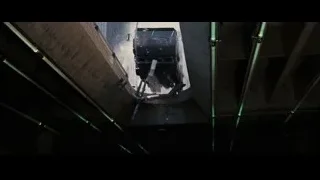 Armored vehicle driving through dark tunnel — Batman: The Dark Knight Rises