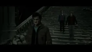 three young men walking up stone stairs — Harry Potter and the Deathly Hallows 2