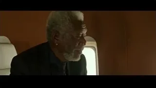 elderly man looking out airplane window — Now You See Me 2