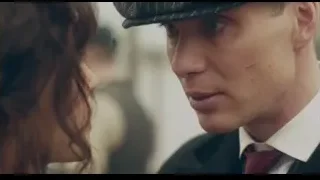 man in suit and hat with woman — Peaky Blinders