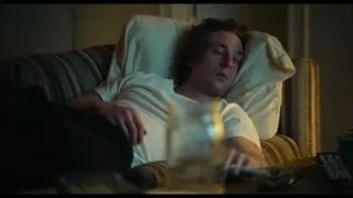 young man sleeping on a couch — The Bear
