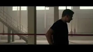young man deep in thought in concrete room — Bruce Lee: Birth of The Dragon