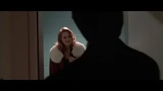 man and woman in formal attire in hallway — American Psycho